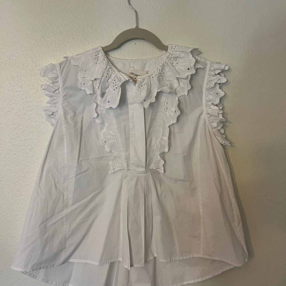 White Sleeveless Ruffled Blouse with Bib Collar